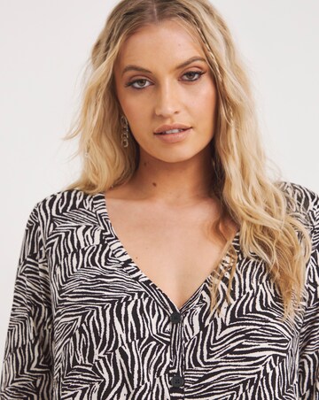 Zebra Button Front Peplum Longline Top