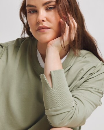 Sage Exposed Seam Dip Back Sweatshirt