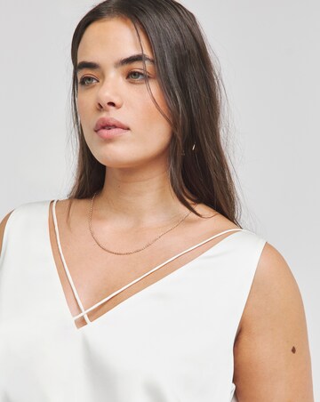 Ivory Sleeveless Criss Cross Satin Vest