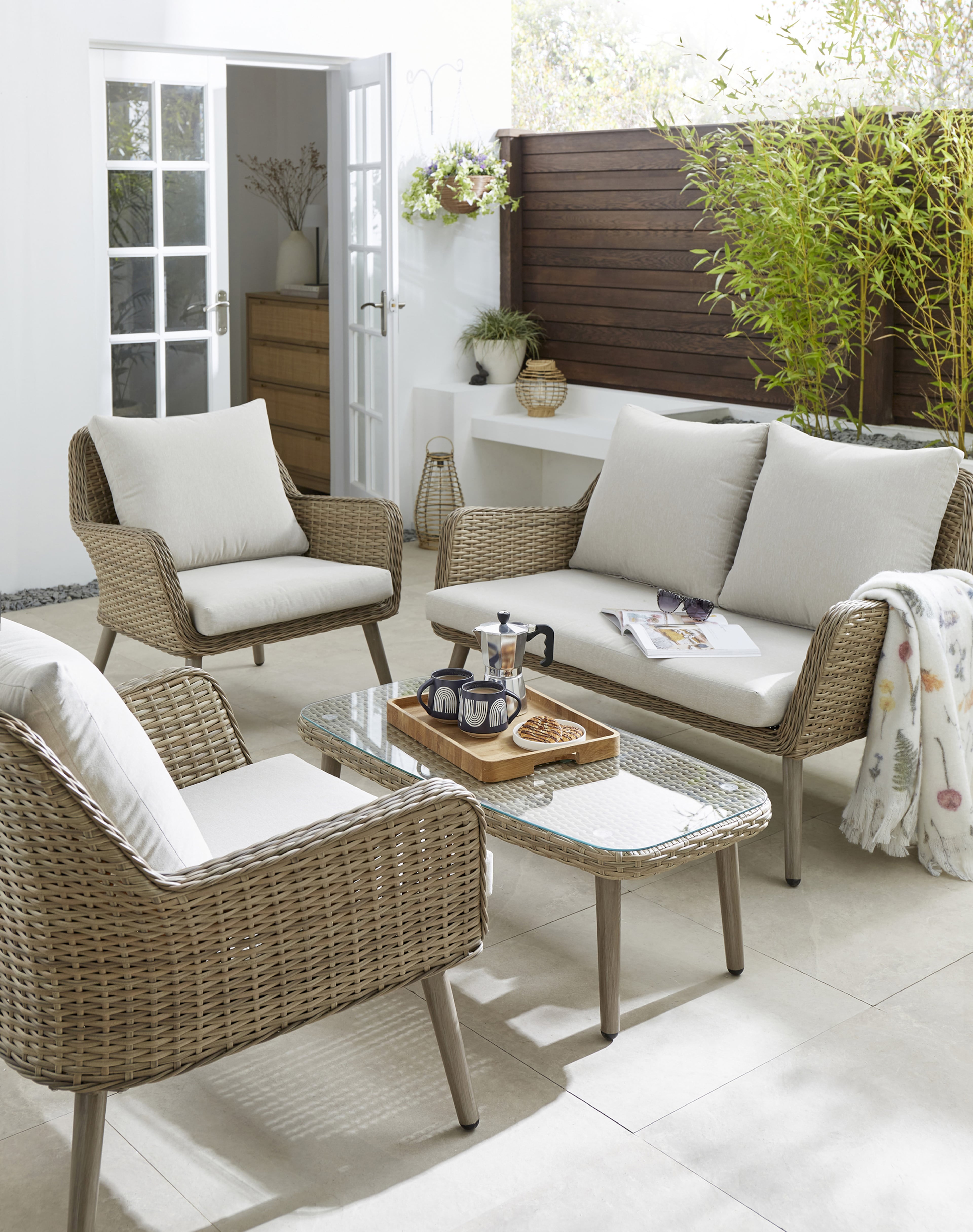 A garden lounge set with a coffee table
