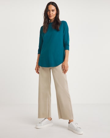 The Longline Curved Hem