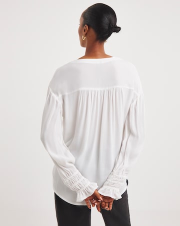 Ivory Button Through Dipped Back Blouse