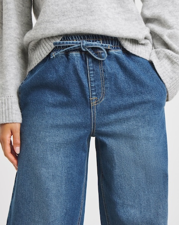 Mid Wash Tie Waist Jogger Jeans